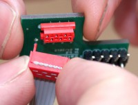 Connect the red connector to "Safiros Mux 16" component. The tip on the plug to the hole on the board!