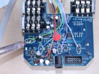 Solder W1 - W4 digital wipers. They are in the middle of each triplet pads under each potentiometer.